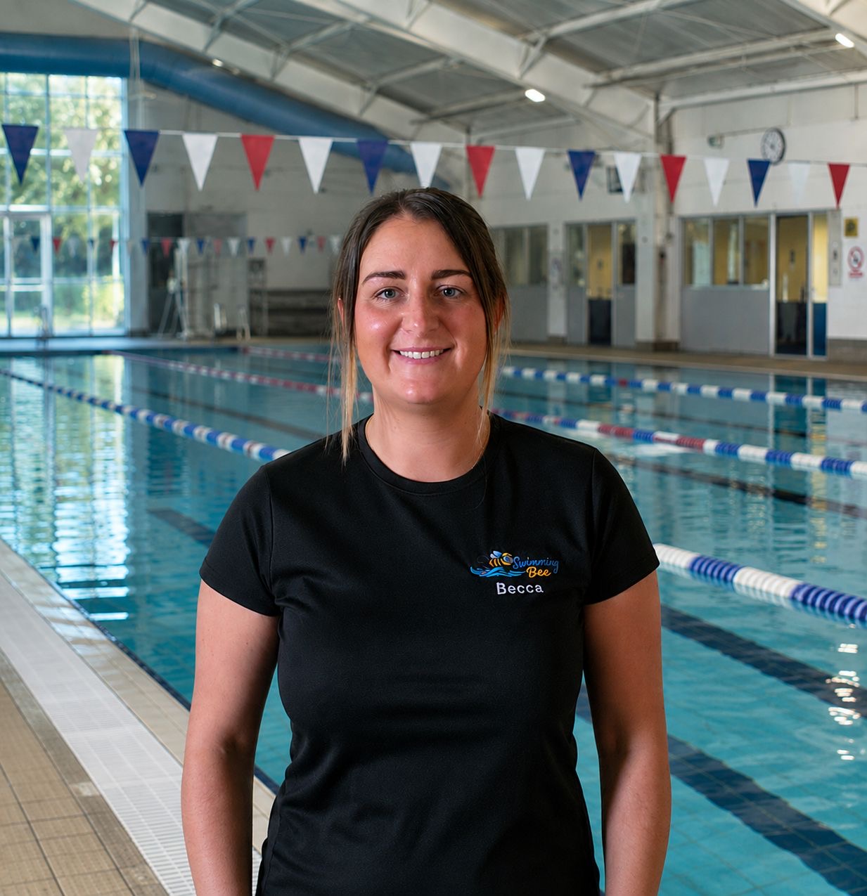 Rebecca Clark, owner and swimming instructor at The Swimming Bee, poolside at Wigton Baths